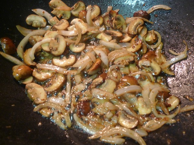 sauteing the garlic, onion, mushrooms in melted butter