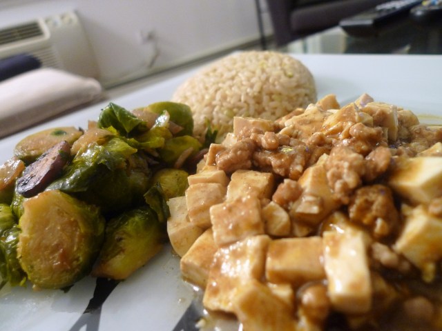 chinese mabo tofu served with brussel sprouts and rice