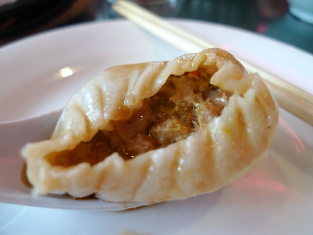 nibble the top of the dumpling and drink the soup inside