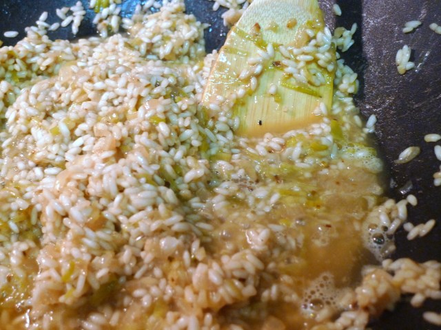 stir in the warm broth 1/2 cup at a time