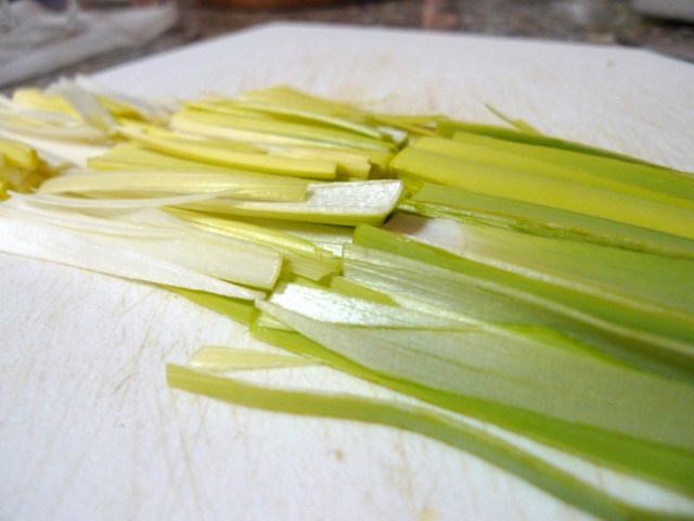 cut leeks lengthwise into quarters