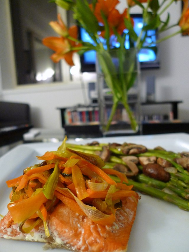 salmon with caramelized leeks served with sauteed asparagus and mushrooms