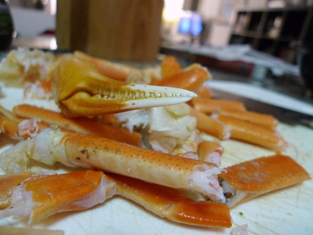 hack the crab legs into 2-3" pieces with a large heavy knife