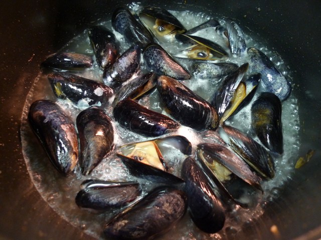 cook in wine until the mussels open