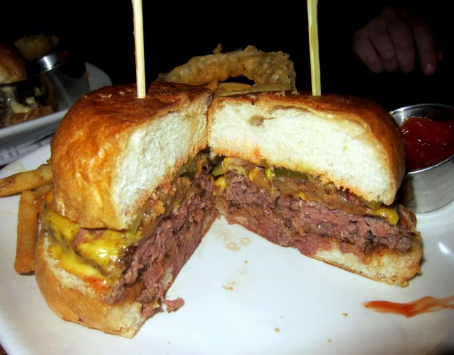 Bash Style with caramelized onion & bacon jam, pickles, cheese