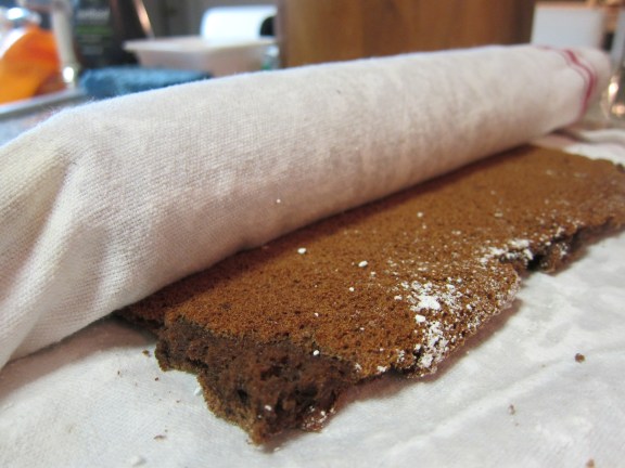 rolling the cake into a towel
