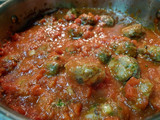 gently add the koftas to the sauce and simmer
