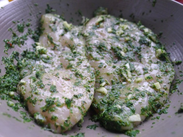 rub the chicken breasts in the pesto