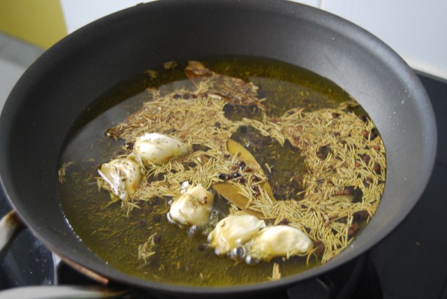 toast the herbs and garlic in olive oil