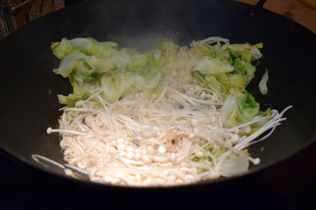 add in the enoki and cook until water has evaporated