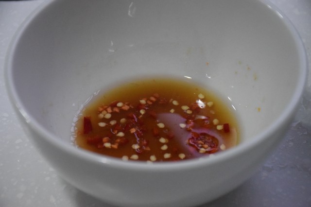 lime juice, fish sauce, chilies, oil, sugar