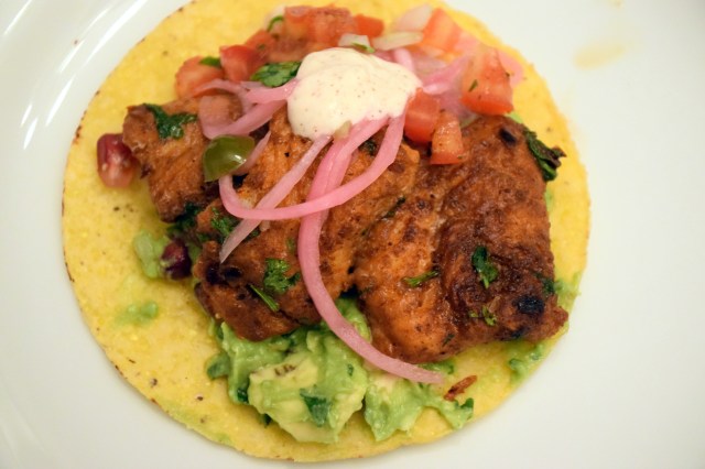 baked fish tacos with pickled red onions, guac, chili-lime sour cream