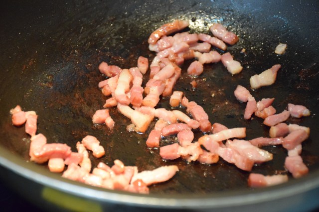 cook lardons over the stovetop