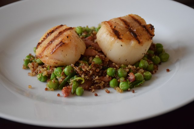 spoon the quinoa mix on a plate then top with scallops